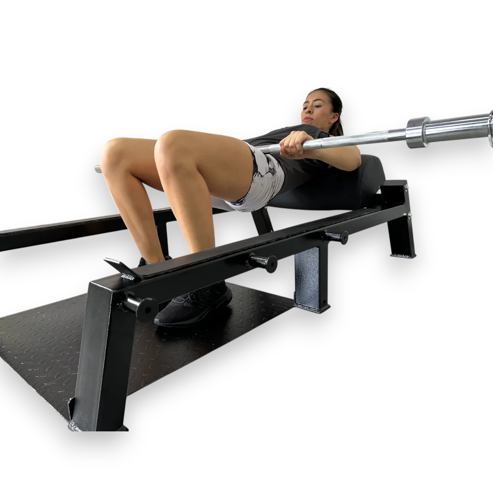 Persona realizando ejercicio de hip thrust en el banco Home Athletic